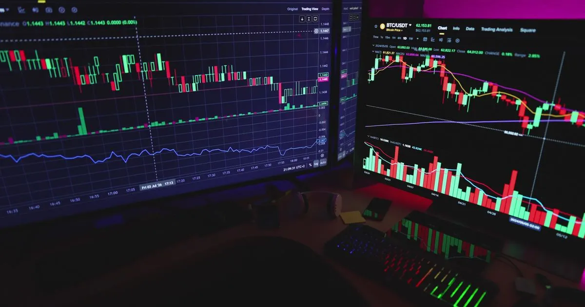 A wall of trading monitors