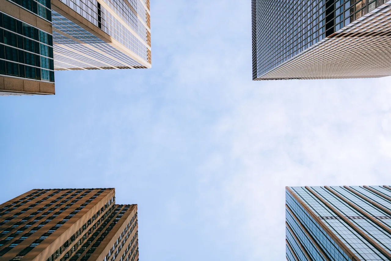 Looking up between office towers